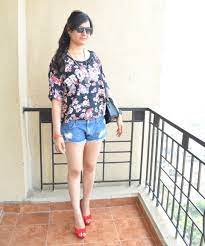Floral top with denim shorts
